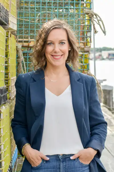 Women in front of lobster traps